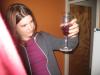 Alice looks suspiciously at her 'special' drink...