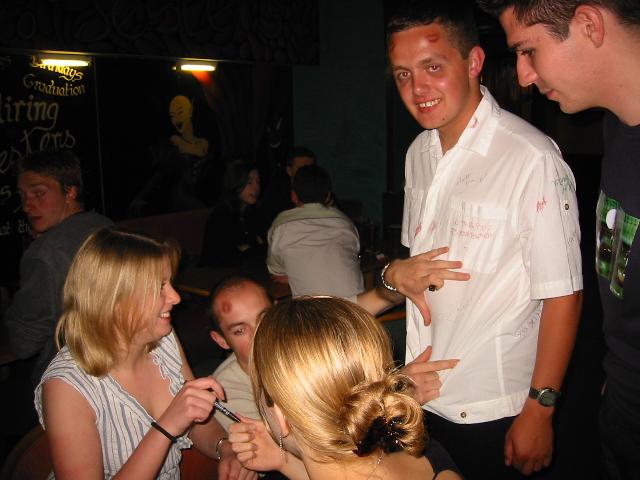 Some more ladies sign the shirt