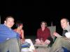 All sitting round on the beach